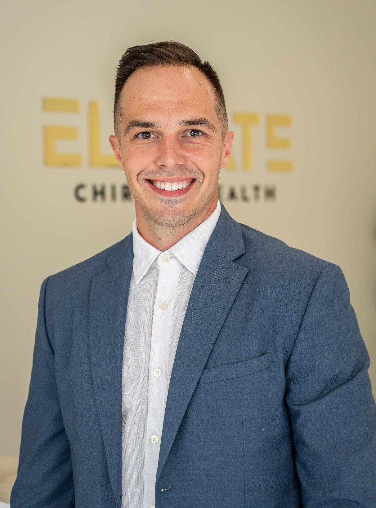 Dr. Devon Lyons, chiropractor at Elevate Chiro & Health in Delray Beach, Florida.