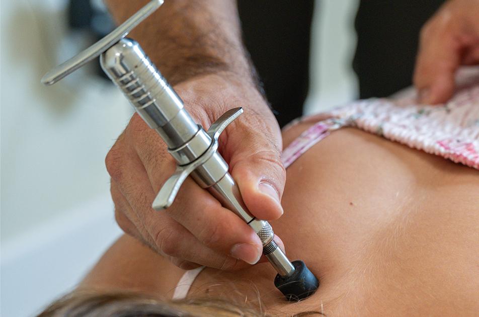 Torque Release Technique adjustment at Elevate Chiro & Health in Delray Beach.